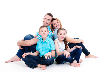 Caucasian happy smiling young family with two children