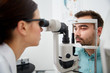 © Syda Productions - optician with tonometer and patient at eye clinic