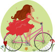 Beautiful young girl rides a Bicycle with positive emotions.
