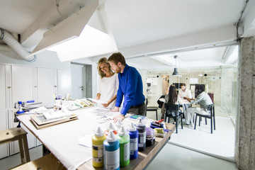 Wall Mural - Young people working in the office