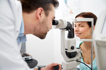 Poster - optician with tonometer and patient at eye clinic