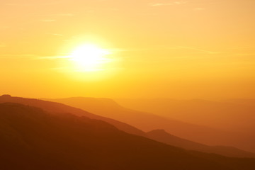 Wall Mural - beautiful sunset at the mountains.