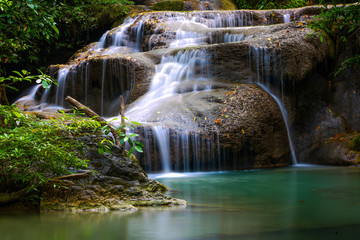  waterfall, green fern, green water in forest