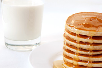 Wall Mural - Pancakes with maple syrup and milk. Pancake's Day