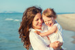 © sborisov - Mother and daughter on the beach