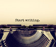 close up image of typewriter with paper sheet and the phrase: start writing . copy space for your text. terto filtered
