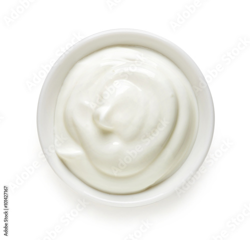 Fényképezés  White bowl of cream, top view