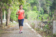 © Odua Images - Young asian woman doing excercise outdoor in a park, jogging