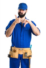 Wall Mural - Plumber making good-bad sign