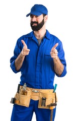 Wall Mural - Plumber pointing to the front