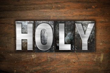 Wall Mural - Holy Concept Metal Letterpress Type