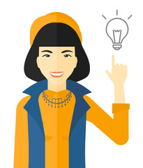 Poster - woman pointing at light bulb.