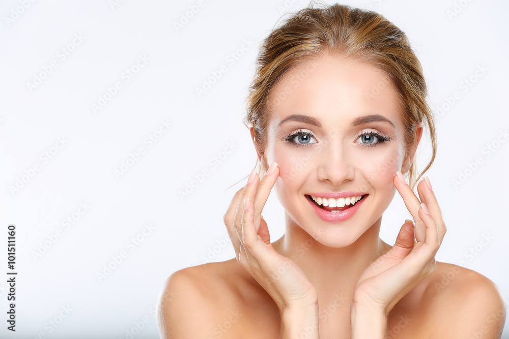 Young woman touching her face isolated on white background - obrazy, fototapety, plakaty 