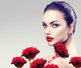 Poster - Beauty fashion model woman face. Portrait with red rose flowers