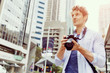 © Sergey Nivens - Male photographer taking picture