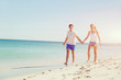 © Sergey Nivens - Romantic young couple on the beach