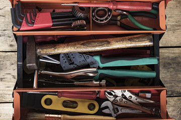 old tool in tool box on the wood table