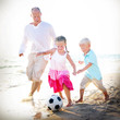 © Rawpixel.com - Father Kids Playing Football Together Summer Leisure Concept