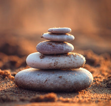 Stack Of Pebbles On The Beach