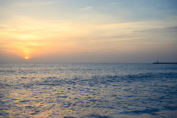 Wall Mural - Sunset over sunny ocean background