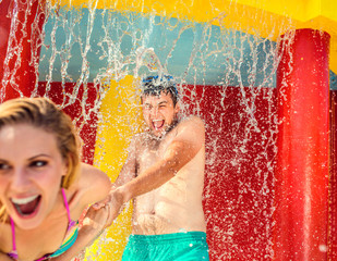 Canvas Print - Beautiful couple in the swimming pool