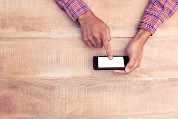 Poster - Overhead view of man texting