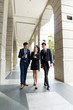 © leungchopan - Group of business people chatting on street