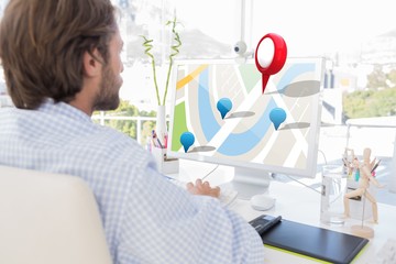 Poster - Composite image of desinger working on his computer