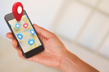 Poster - Composite image of womans hand holding black smartphone
