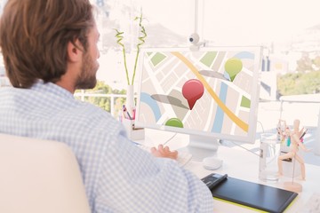 Poster - Composite image of desinger working on his computer