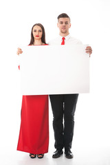 man and woman holding white poster