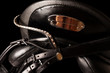 Black leather premium dressage saddle  isolated. close up