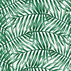  Watercolor tropical palm leaves seamless pattern. Vector illustration.
