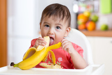 Cute Baby Eating Banana
