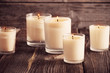 © Maya Kruchancova - scented candles on old wooden background