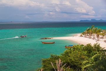 Wall Mural - Sunrise beach with blue cloud sky in Koh Lipe island.