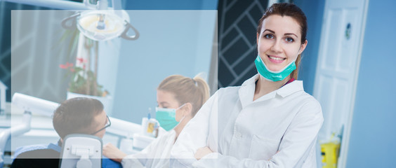 Portrait of beautiful female dentist at busy dentist office. Empty space for text sample.