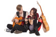 © Stanislav Komogorov - Young musicians play guitars