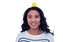 Smiling Asian Woman With Paper Crown