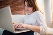 © WavebreakMediaMicro - Pretty woman using her laptop