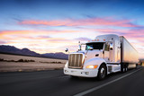 Fototapeta Nowy Jork - Truck and highway at sunset - transportation background