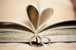 Wedding ring about an book with pages in the shape of a heart