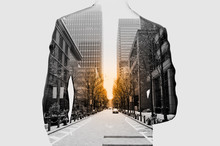 Double Exposure Of Businessman In Suit And Cityscape. He's Looking For His Success In Business And Idea For Life