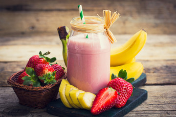 Wall Mural - Fresh strawberry and banana smoothie