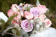winter bouquet with large roses in purple tint