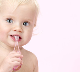 little child baby brushink teeth