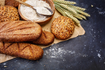 Wall Mural - Different bread on a  dark background