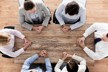 Poster - close up of business team sitting at table