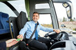 © Syda Productions - bus driver taking ticket or card from passenger