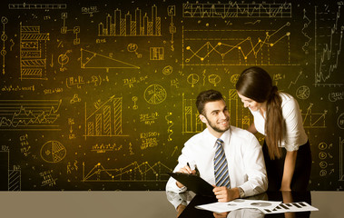 Canvas Print - Business couple with diagram background